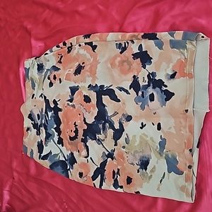 Skirt never worn, has Abstract paint on it.